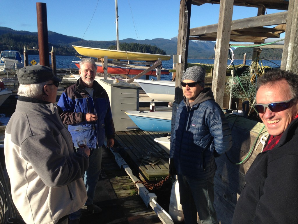 Kevin, Errol, Gregor and Kim toasting to the new year and the sunshine of January First at the poise cove marina.
