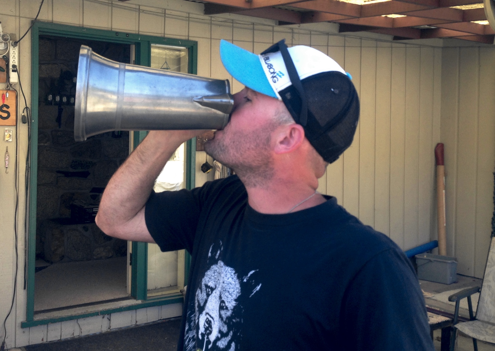 Nick Farrer drinks from the Tankard after winning the 2018 Poise Cove Classic.